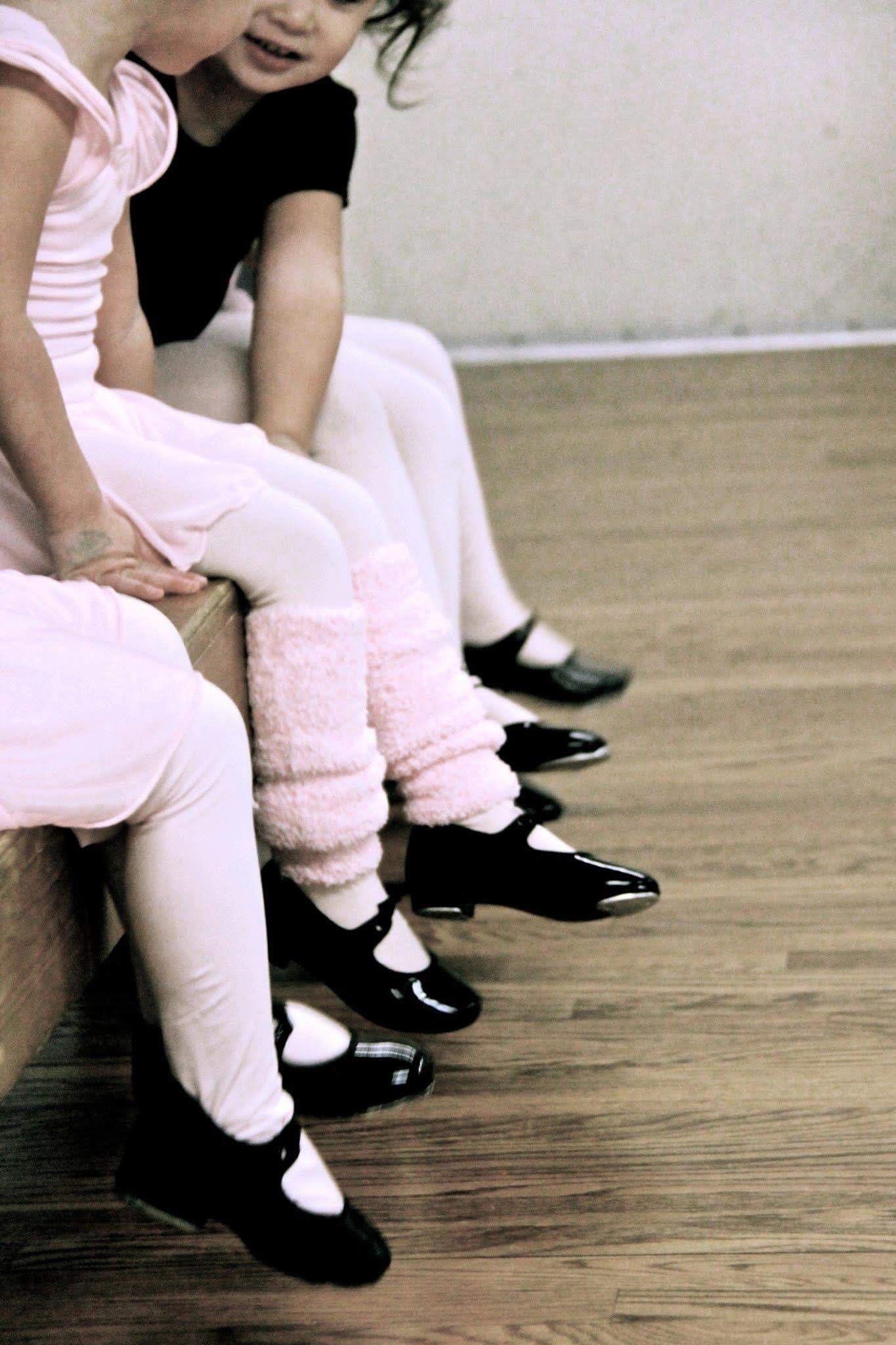Dancers practicing in a bright mirrored studio at JWSD Cross Park